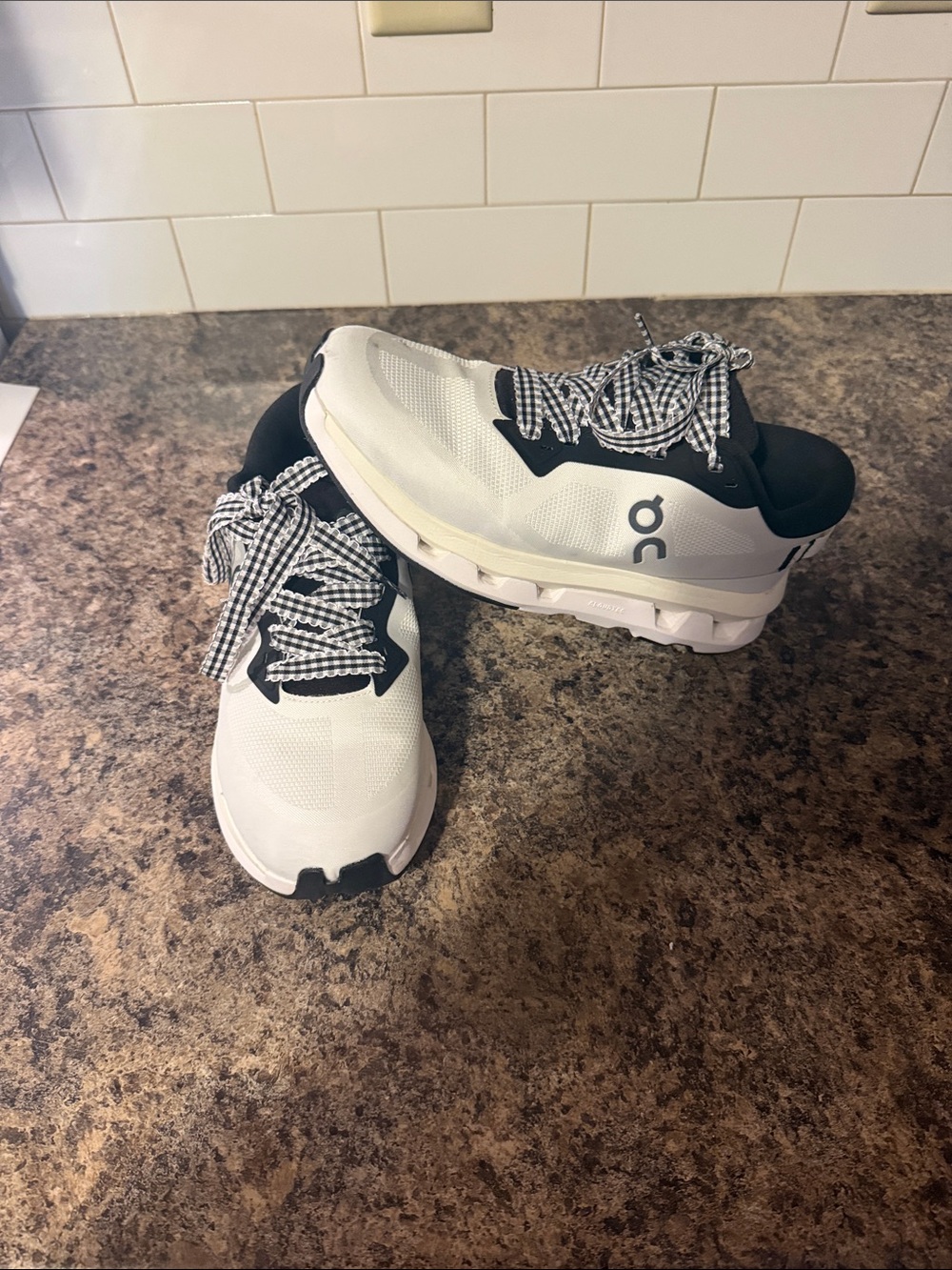 On Running White and Black Sneakers